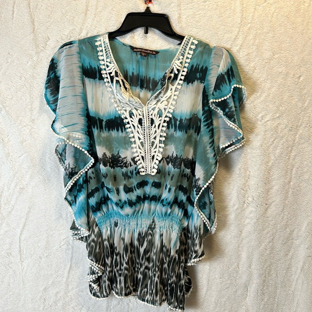 Butterfly style top.  100% Polyester